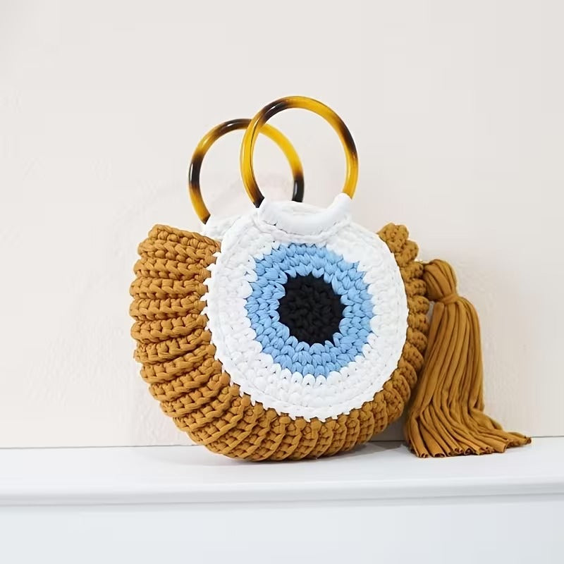 Bolsa artesanal feminina em crochê olho grego para looks de verão