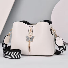 bolsa bucket saybeleze butterfly charm branco