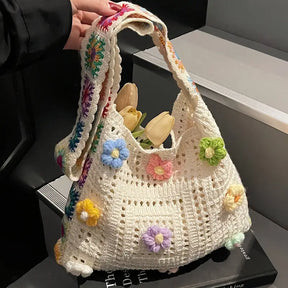 bolsa transversal crochê preta estilo boho com flores branco