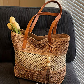 bolsa feminina trama marrom com tassel e textura estruturada