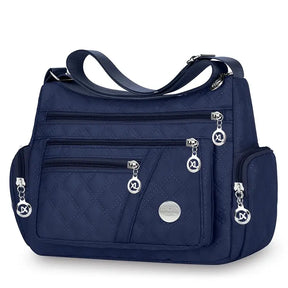bolsa tiracolo azul marinho matelassê feminina