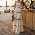 alt="Conjunto feminino longo bege moderno tomara que caia com detalhes pretos"
