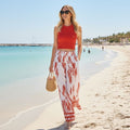 alt="Conjunto casual feminino saia longa floral com blusa vermelha estilo verão"