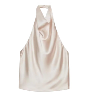 Design exclusivo da blusa Alicante com caimento solto ao corpo e toque de seda.