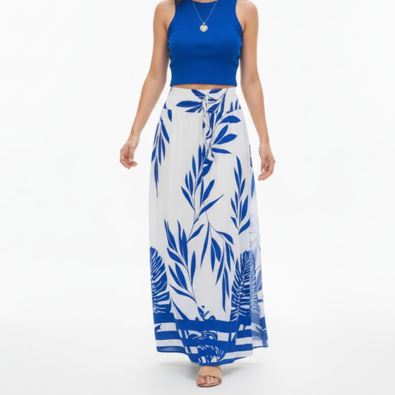 alt="Saia feminina longa estampada azul com folhagem tendência feminina 2025"