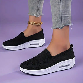 tenis-feminino-plataforma-air-knit-preto.webp
