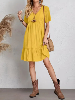 vestido feminino soltinho com babado na barra amarelo
